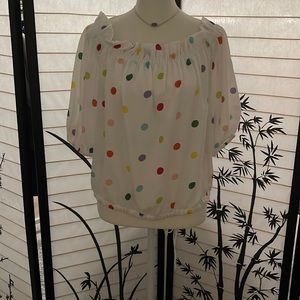 Fun polkadot blouse ready for a night on the town!